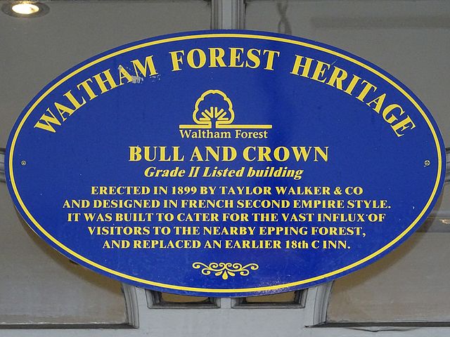 Blue plaque № 9678 - The Bull and Crown. Grade II Listed building - Erected in 1899 by Taylor Walker and Company and designed in French Second Empire style. It was built to cater for the vast influx of visitors to the nearby Epping Forest and replaced an earlier 18th century inn