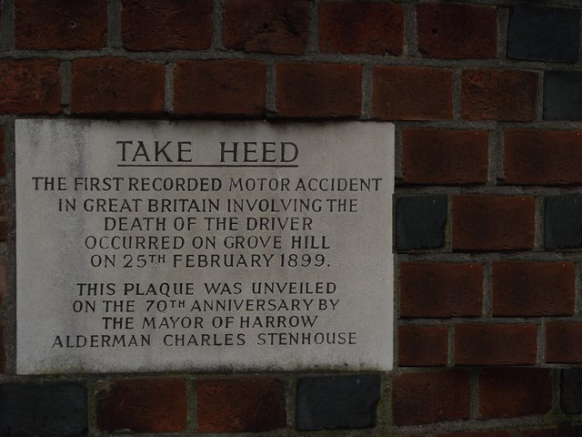 Edwin Sewell and James Richer white plaque - Take Heed. The first recorded motor accident in Great Britain involving the death of the driver occurred on Grove Hill on 25th February 1899.