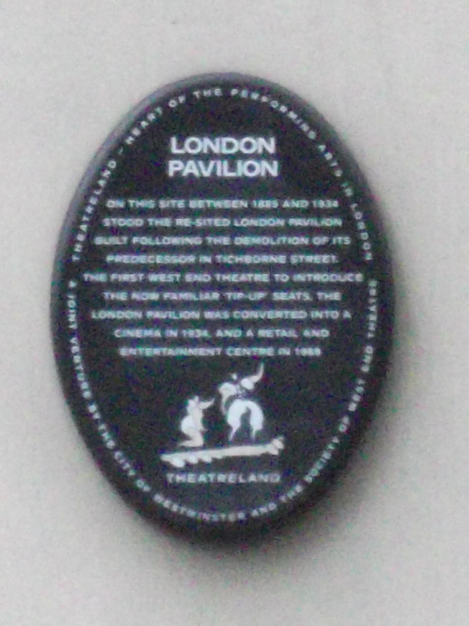 London Pavilion black plaque - London Pavilion On this site between 1885 and 1934 stood the re-sited London Pavilion built following the demolition of its predecessor in Tichborne Street. The first West End theatre to introduce the now familiar 