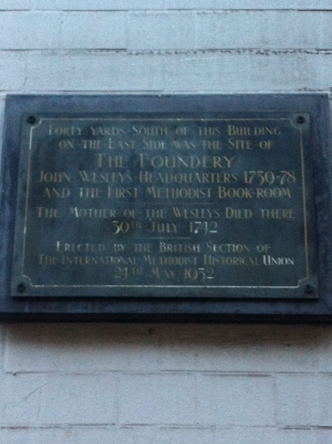 John Wesley and Susanna Annesley black plaque - Forty yards south of this building on the last side of the site of The Foundery, John Wesley's headquarters 1750-78 and the first Methodist book room. The mother of the Wesleys died there 30th July 1742.