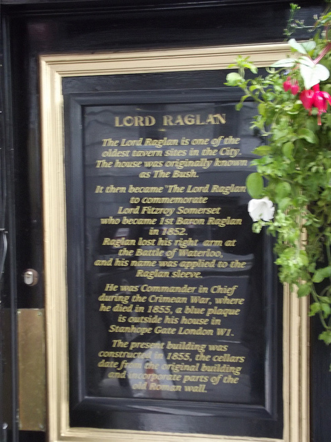 FitzRoy Somerset black plaque - Lord Raglan    The Lord Raglan is one of the oldest tavern sites in the City.  The house was originally known as The Bush.    It then became 