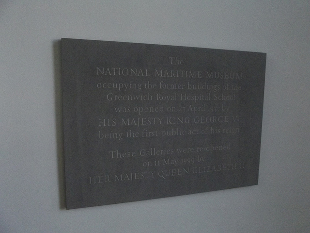 George VI, Elizabeth II, National Maritime Museum, and Royal Hospital School, London bronze plaque - The National Maritime Museum  occupying the former buildings of the   Greenwich Royal Hospital School  was opened on 27 April 1937 by  His Majesty King George VI  being the first public act of his reign    These Galleries were re-opened   on 11 May 1999 by  Her Majesty Queen Elizabeth II