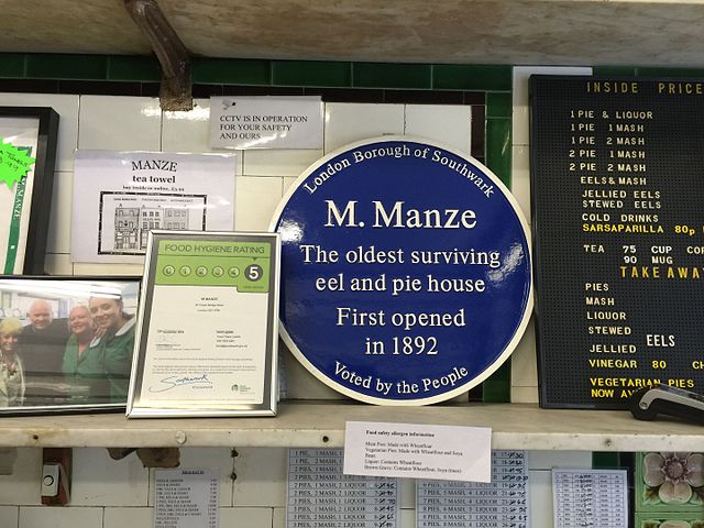 Michele Manze blue plaque - M. Manze The oldest surviving eel and pie house. First opened in 1892