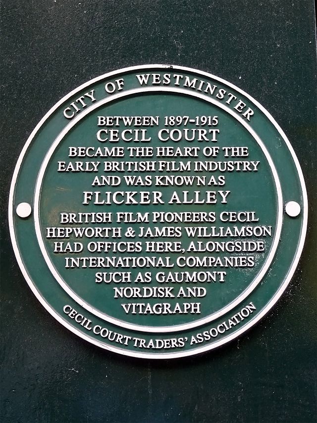 Cecil Hepworth and James Williamson green plaque - Between 1897-1915 Cecil Court became the heart of the early British film industry and was known as Flicker Alley. British film pioneers Cecil Hepworth & James Williamson had offices here, alongside international companies such as Gaumont, Nordisk and Vitagraph