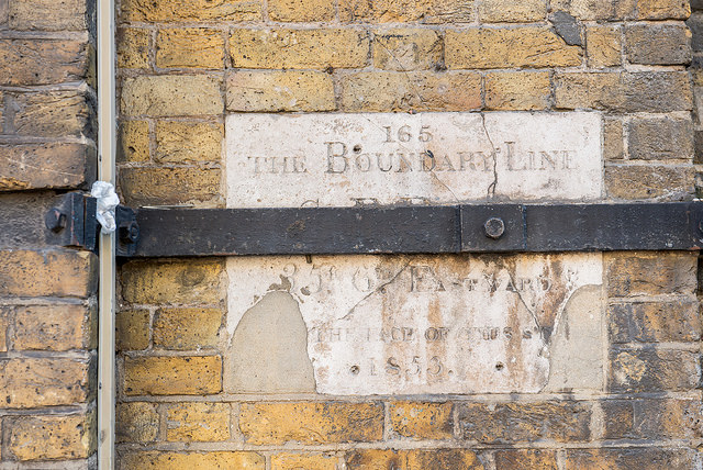 Boundary Line stone plaque - 165 The Boundary Line / St.P.P. extends / 35ft 6 ins eastwards / xxx the face of this st xxx / 1853