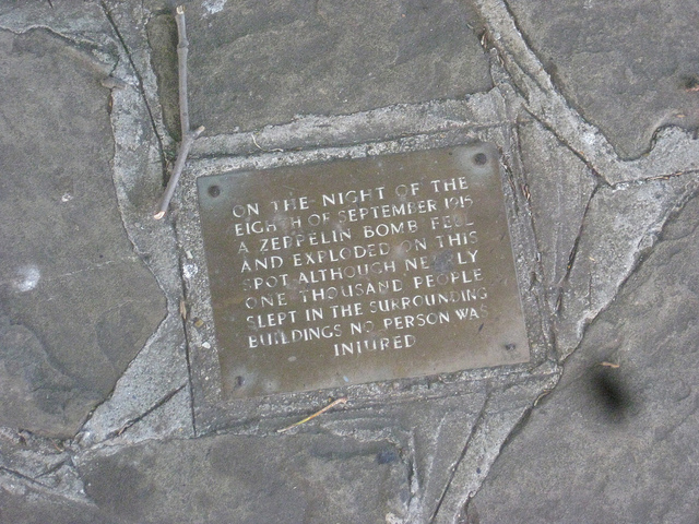 Abraham Alley bronze plaque - On the night of the Eighth of September 1915 a Zeppelin bomb fell and exploded on this spot although nearly one thousand people slept in the surrounding buildings no person was injured