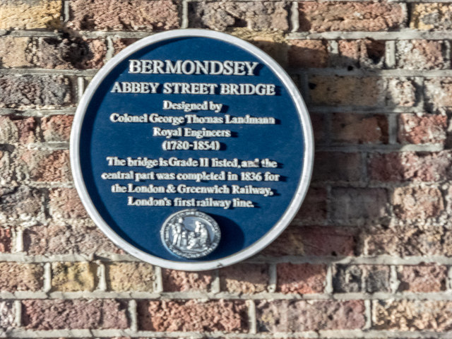 Abbey Street Bridge, London and George Thomas Landmann blue plaque - Bermondsey  Abbey Street Bridge  Designed by  Colonel George Thomas Landmann  Royal Engineers  (1780-1854)  The bridge is Grade II listed, and the central part was completed in 1836 for the London & Greenwich Railway, London's first railway line.