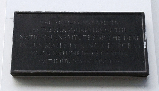 National Institute for the Deaf bronze plaque - This building was opened as the headquarters of the National Institute for the Deaf by His Majesty King George VI when HRH the Duke of York on the 11th day of June 1936.