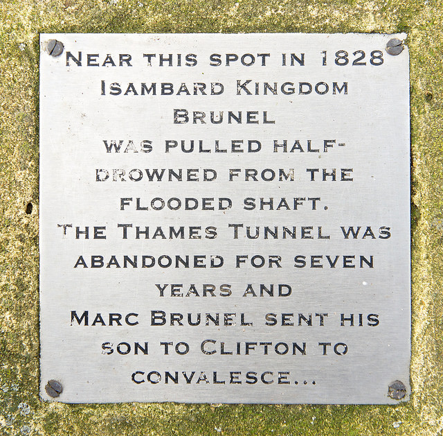 Marc Isambard Brunel, Isambard Kingdom Brunel, and Thames Tunnel brushed metal plaque - Near this spot in 1828 Isambard Kingdom Brunel was pulled half-drowned from the flooded shaft. The Thames Tunnel was abandoned for seven years and Marc Brunel sent his son to Clifton to convalesce...