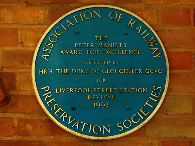Richard blue plaque - The Peter Manisty  Award For Excellence  Presented By  HRH The Duke Of Gloucester GCVO  For  Liverpool Street Station   Revival  1992