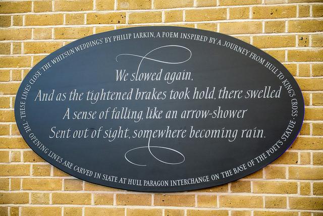 Philip Larkin black plaque - We slowed again, And as the tightened brakes took hold, there swelled A sense of falling, like an arrow-shower  Sent out of sight, somewhere becoming rain.
