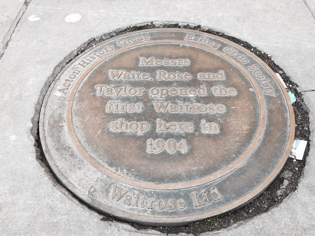 Wallace Waite, Arthur Rose, and David Taylor brown plaque - Messrs Waite, Rose and Taylor opened the first Waitrose shop here in 1904