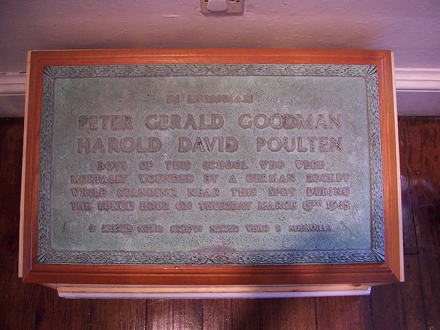 Bronze plaque № 32959 - In memoriam.  Peter Gerald Goodman, Harold David Poulten. Boys of this school who were mortally wounded by a German rocket while standing near this spot during the lunch hour on Thursday March 15th 1945