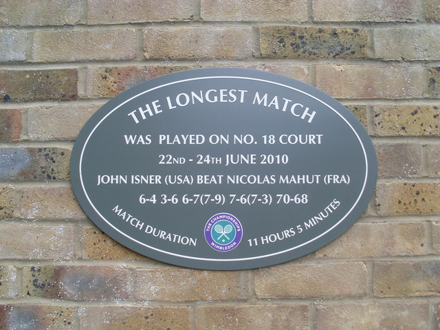 John Isner and Nicolas Mahut blue plaque - The longest match was played on no. 18 court 22nd-24th June 2010 John Isner (USA) beat Nicolas Mahut (FRA) 6-4 3-6 6-7(7-9) 7-6(7-3) 70-68 match duration 11 hours 5 minutes