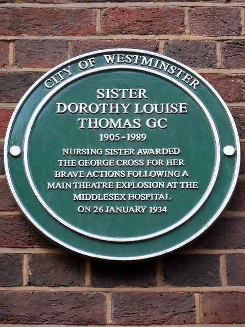 Green plaque № 39174 - Sister Dorothy Louise Thomas GC 1905-1989 nursing sister awarded the George Cross for her brave actions following a main theatre explosion at the Middlesex Hospital on 26 January 1934