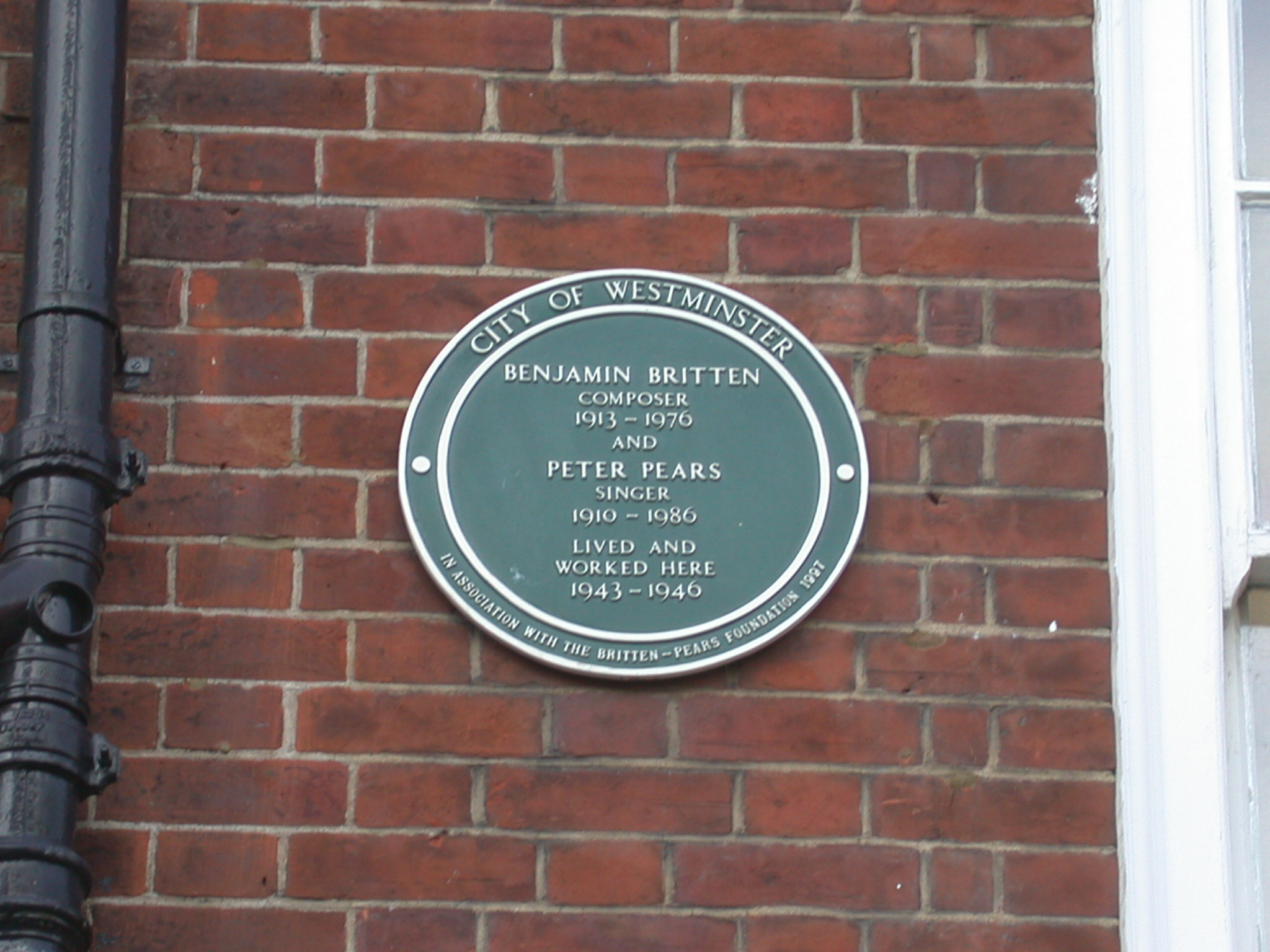 Benjamin Britten and Peter Pears green plaque - Benjamin Britten composer 1913-1976 and Peter Pears singer 1910-1986 lived and worked here 1943-1946