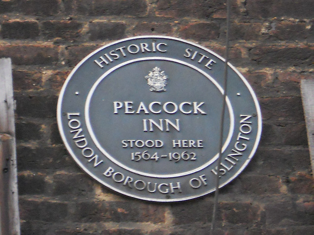 Peacock Inn, Islington black plaque - Historic Site  Peacock Inn  Stood here  1564-1962  London Borough of Islington