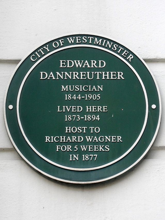 Edward Dannreuther and Richard Wagner green plaque - Edward Dannreuther  Musician  1844-1905  lived here  1873-1894  host to  Richard Wagner  for 5 weeks  in 1877