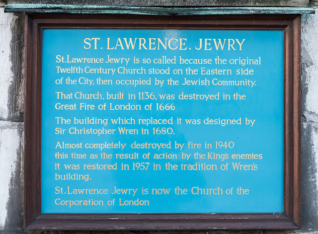 Christopher Wren green plaque - St Lawrence Jewry is so called because the original Twelfth Century Church stood on the Eastern side of the City, then occupied by the Jewish Community.  That Church, built in 1136, was destroyed in the Great Fire of London of 1666  The building which replaced it was designed by Sir Christopher Wren in 1680.  Almost completely destroyed by fire in 1940 this time as the result of action by the King's enemies it was restored in 1957 in the tradition of Wren's building.  St. Lawrence Jewry is now t