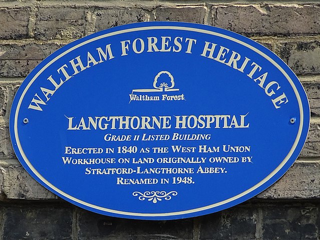 West Ham Union Workhouse blue plaque - Langthorne Hospital. Grade II Listed building. Erected in 1840 as the West Ham Union Workhouse on land originally owned by Stratford-Langthorne Abbey. Renamed in 1948