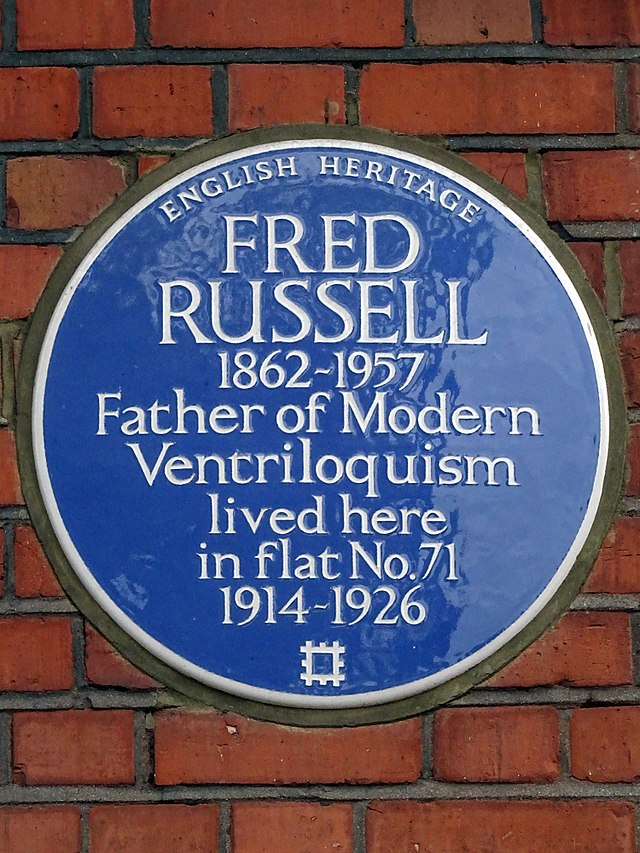 Fred Russell blue plaque - Fred Russell 1862-1957 Father of modern ventriloquism lived here in flat No.71 1914-1926