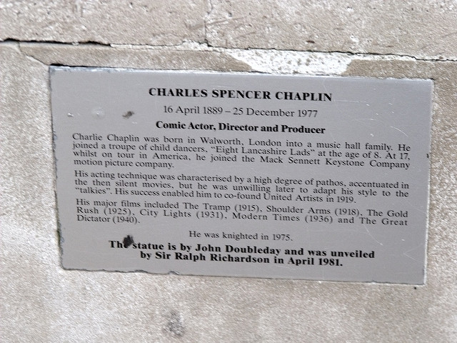 Charlie Chaplin grey plaque - Charles Spencer Chaplin  16 April 1889 - 25 December 1977  Comic Actor, Director and Producer  Charlie Chaplin was born in Walworth, London into a music hall family. He joined a troupe of child dancers, 