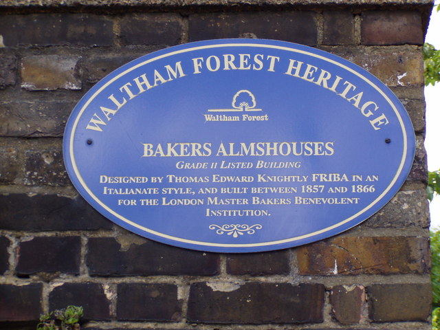 Thomas Edward Knightly and Bakers Almshouses, London blue plaque - Bakers Almshouses. Grade II Listed building. Designed by Thomas Edward Knightly FRIBA in an Italianate style, and built between 1857 and 1866 for the London Master Bakers Benevolent Institution