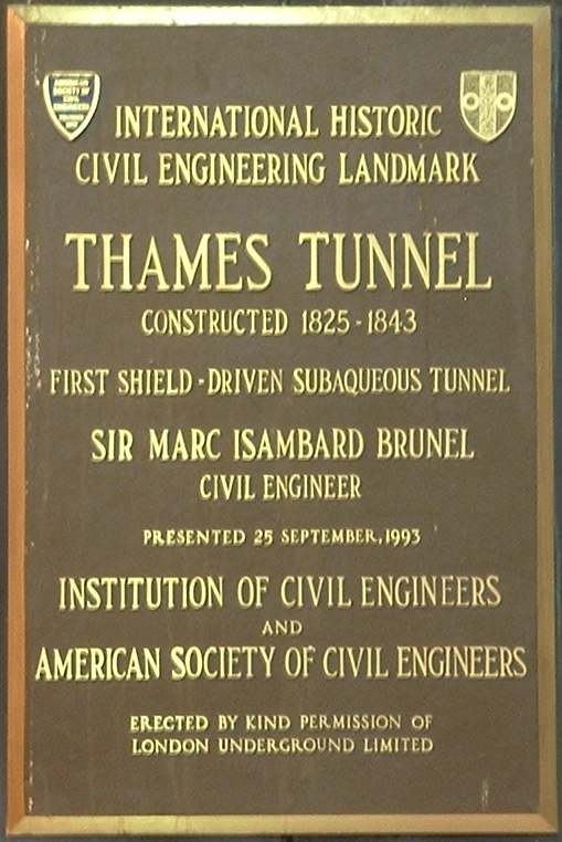 Marc Isambard Brunel and Thames Tunnel brown plaque - Thames Tunnel constructed 1825-1843 first shield-driven subaqueous tunnel. Sir Marc Isambard Brunel civil engineer.