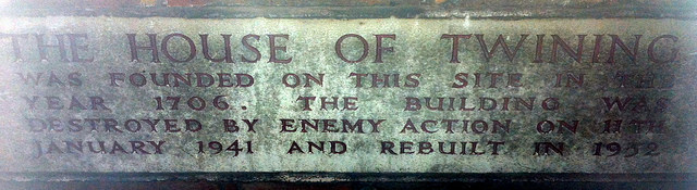 Stone plaque № 32988 - The House Of Twining  was founded on this site in the   year 1706. The building was  destroyed by enemy action on 11th  January 1941 and rebuild in 1952
