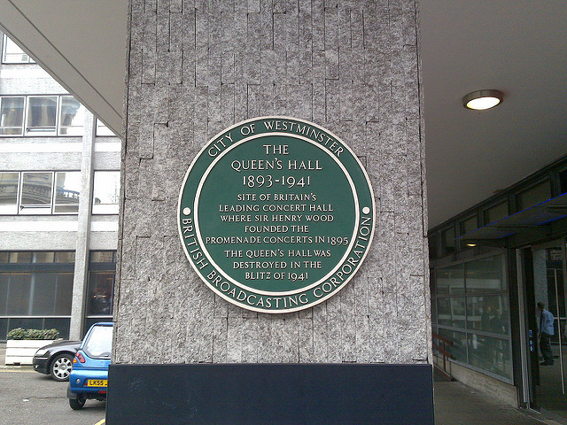 Henry Wood, Queen's Hall, London, and The Promenade Concerts green plaque - The Queen's Hall 1893-1941. Site of Britain's leading concert hall where Sir Henry Wood founded The Promenade Concerts in 1895. The Queen's Hall was destroyed in The Blitz of 1941.