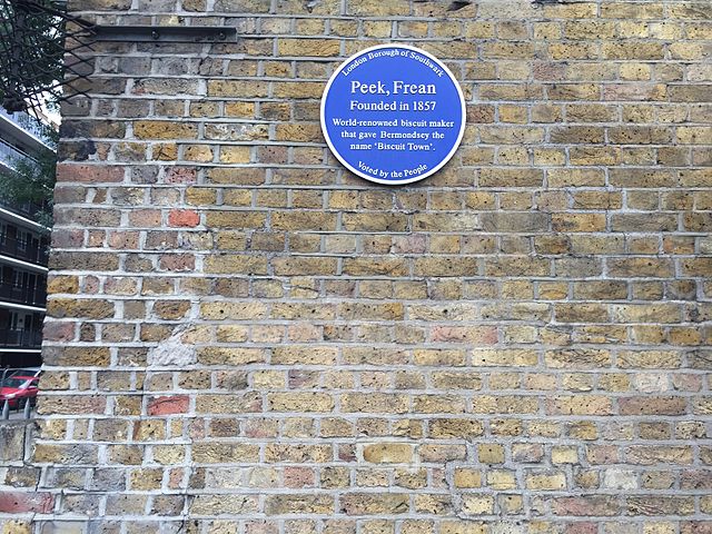 Peek, Frean, George Hender Frean, and James Peek blue plaque - Peek, Frean   Founded in 1857    World renowned biscuit maker that gave    Bermondsey the name 'Biscuit Town'  