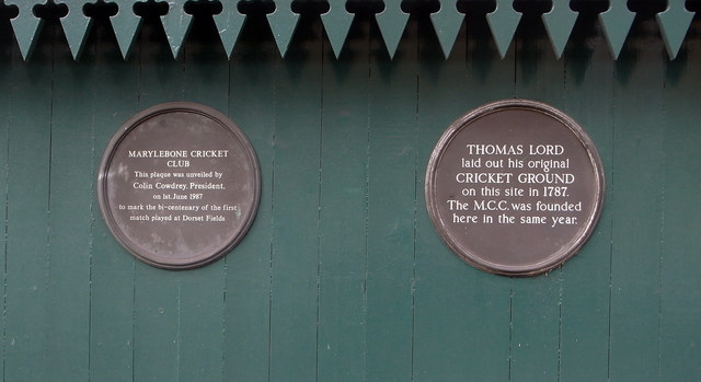 Thomas Lord and Marylebone Cricket Club grey plaque - Thomas Lord  laid out his original  cricket ground  on this site in 1787.  The M.C.C. was founded  here in the same year.