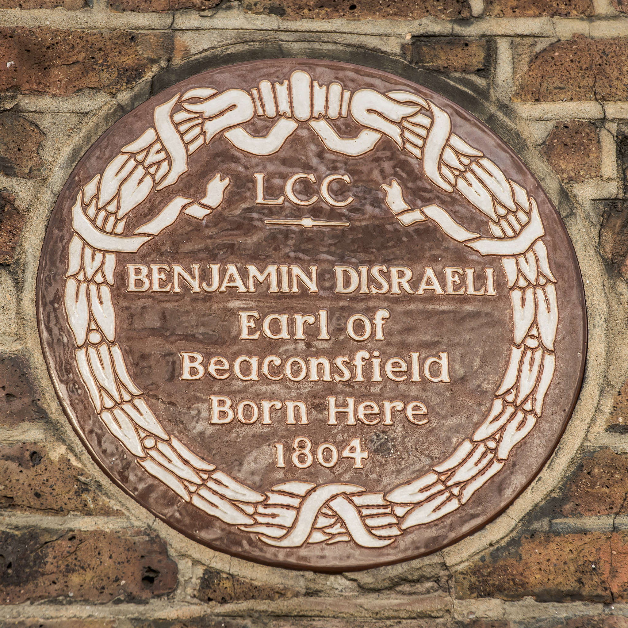 Benjamin Disraeli brown plaque - Benjamin Disraeli  Earl of Beaconsfield born here 1804