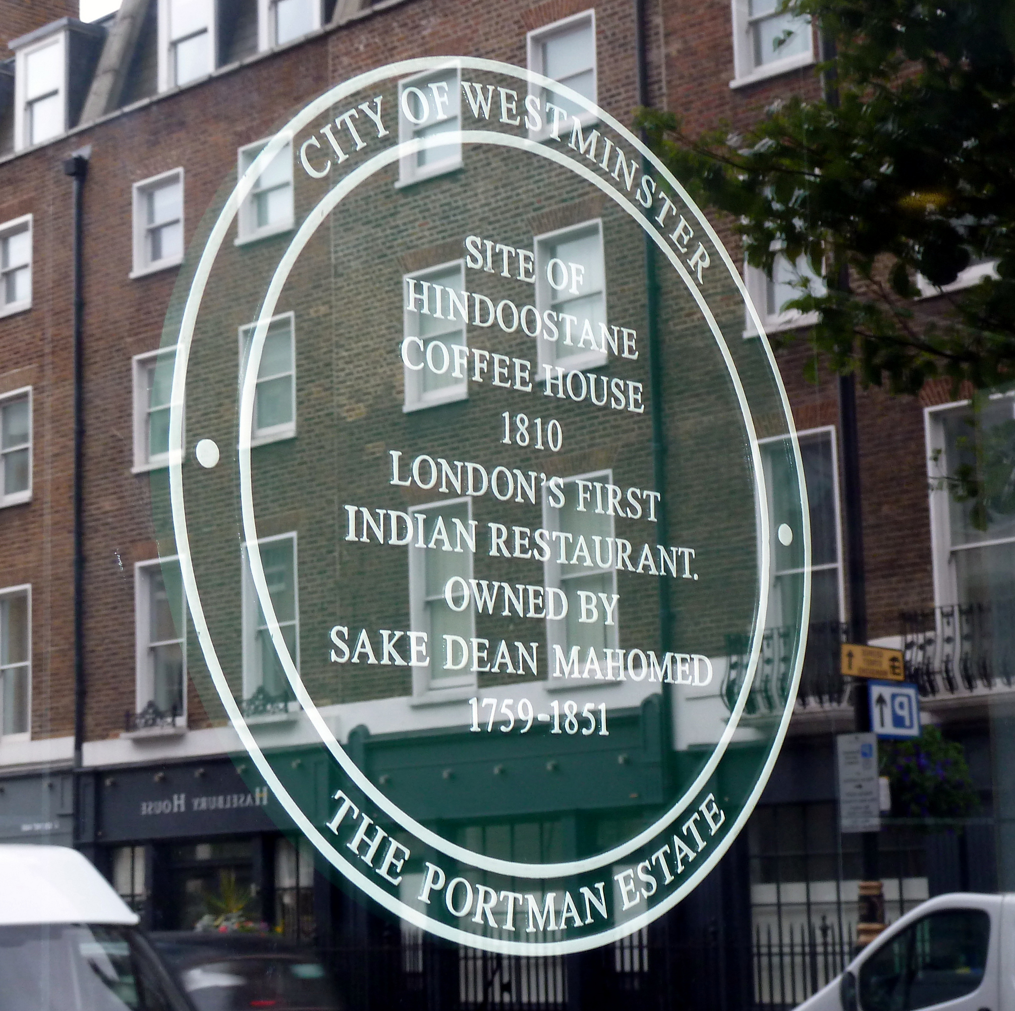 Sake Dean Mahomed and Hindoostane Coffee House green plaque - Site of Hindoostane Coffee House 1810 London's first Indian restaurant owned by Sake Dean Mahomed 1759-1851