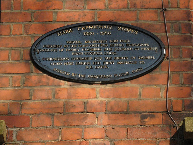 Marie Stopes and Reginald Ruggles Gates black plaque - Marie Carmichael Stopes  1880-1958  Writer, dramatist and poet.  Publicist of the campaign for sexual education.  Advocate of family planning and founder of pioneer  birth control clinic.  Courageous crusader for the rights of women.  Lived here during her first marriage to  R.R. Gates.