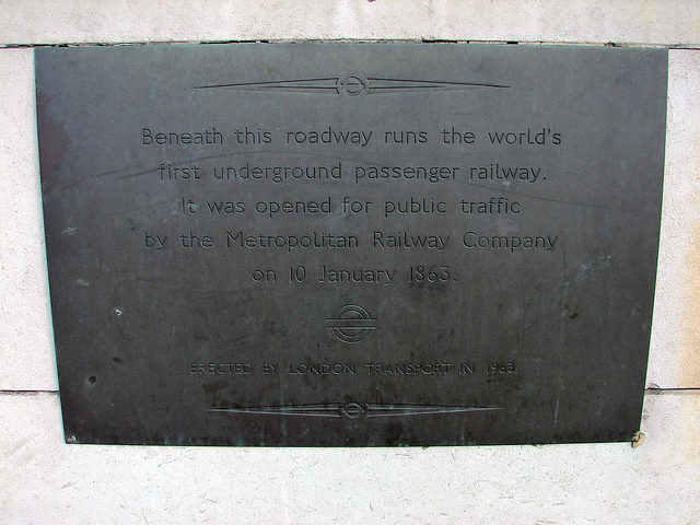 Metropolitan Railway bronze plaque - Beneath this roadway runs the world's  first underground passenger railway.  It was opened for public traffic  by the Metropolitan Railway Company  on 10 January 1863